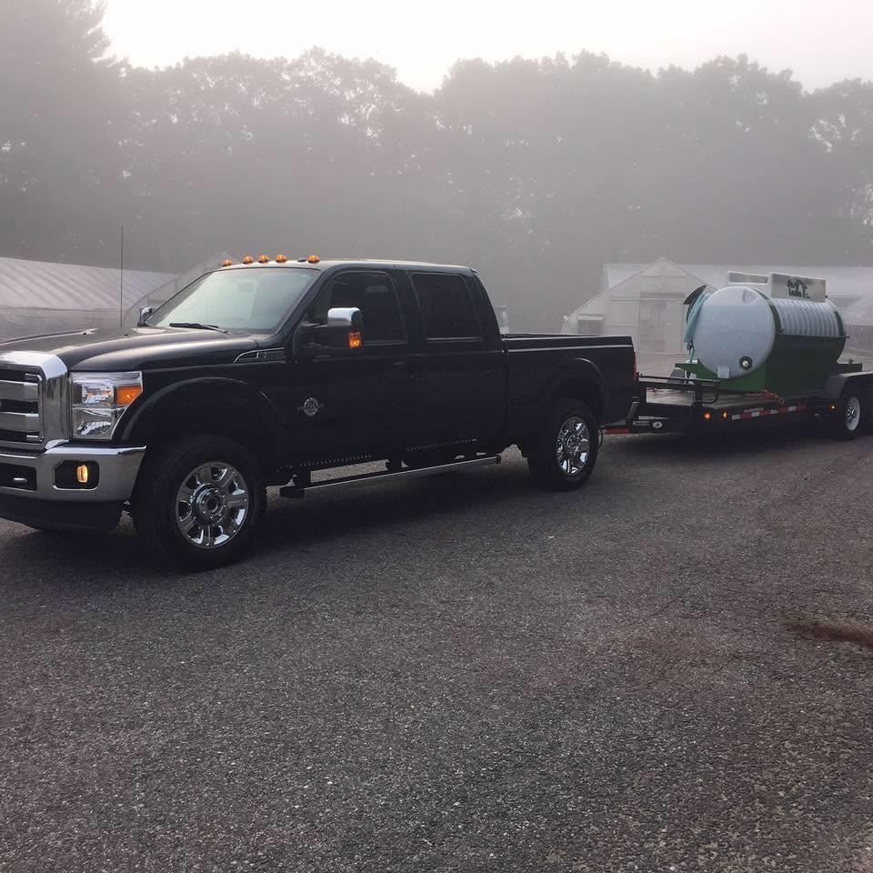 Parker pickup transporting job-site application equipment